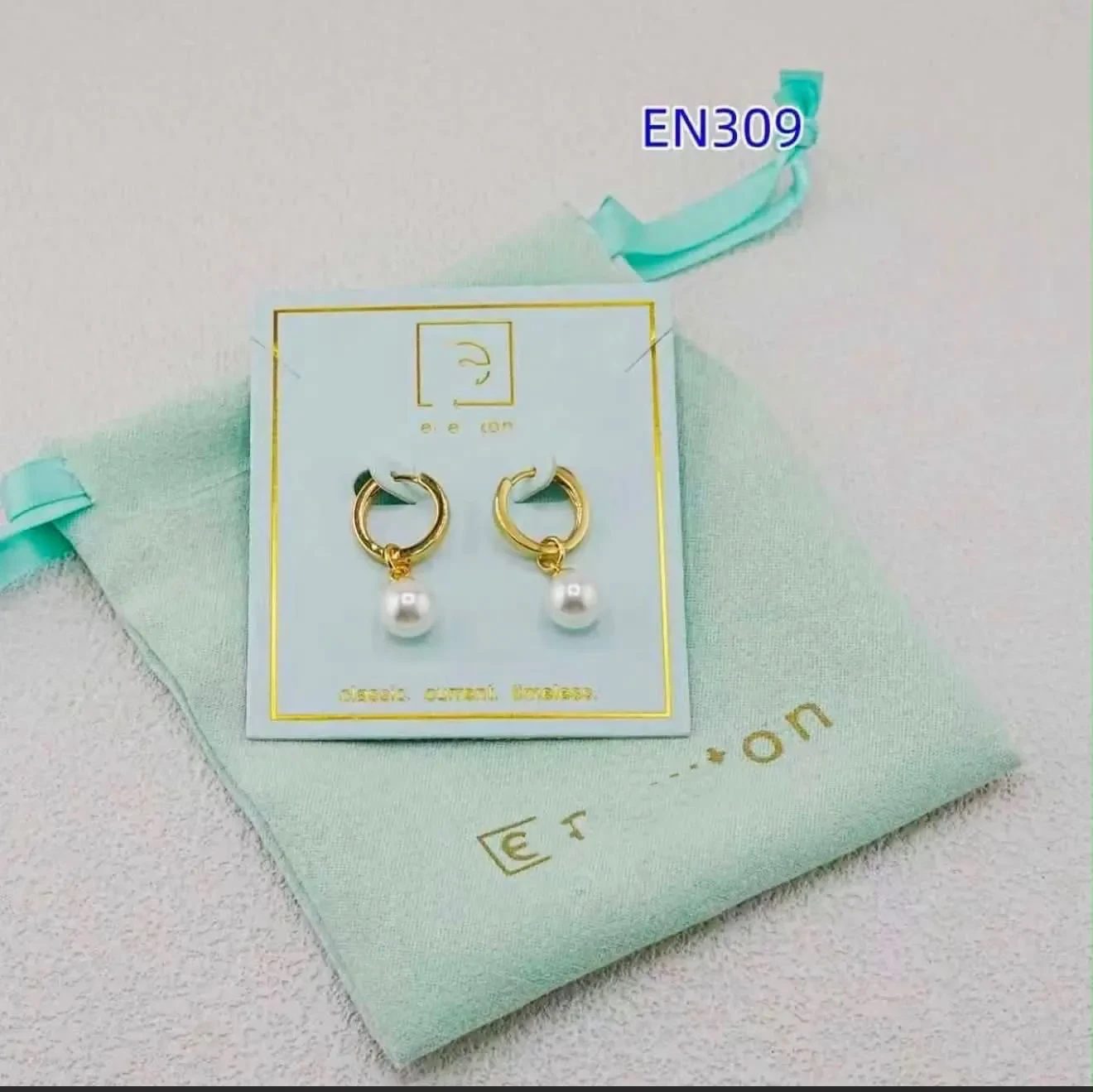 00069 ENewton Pearl Earrings 10-2-2026