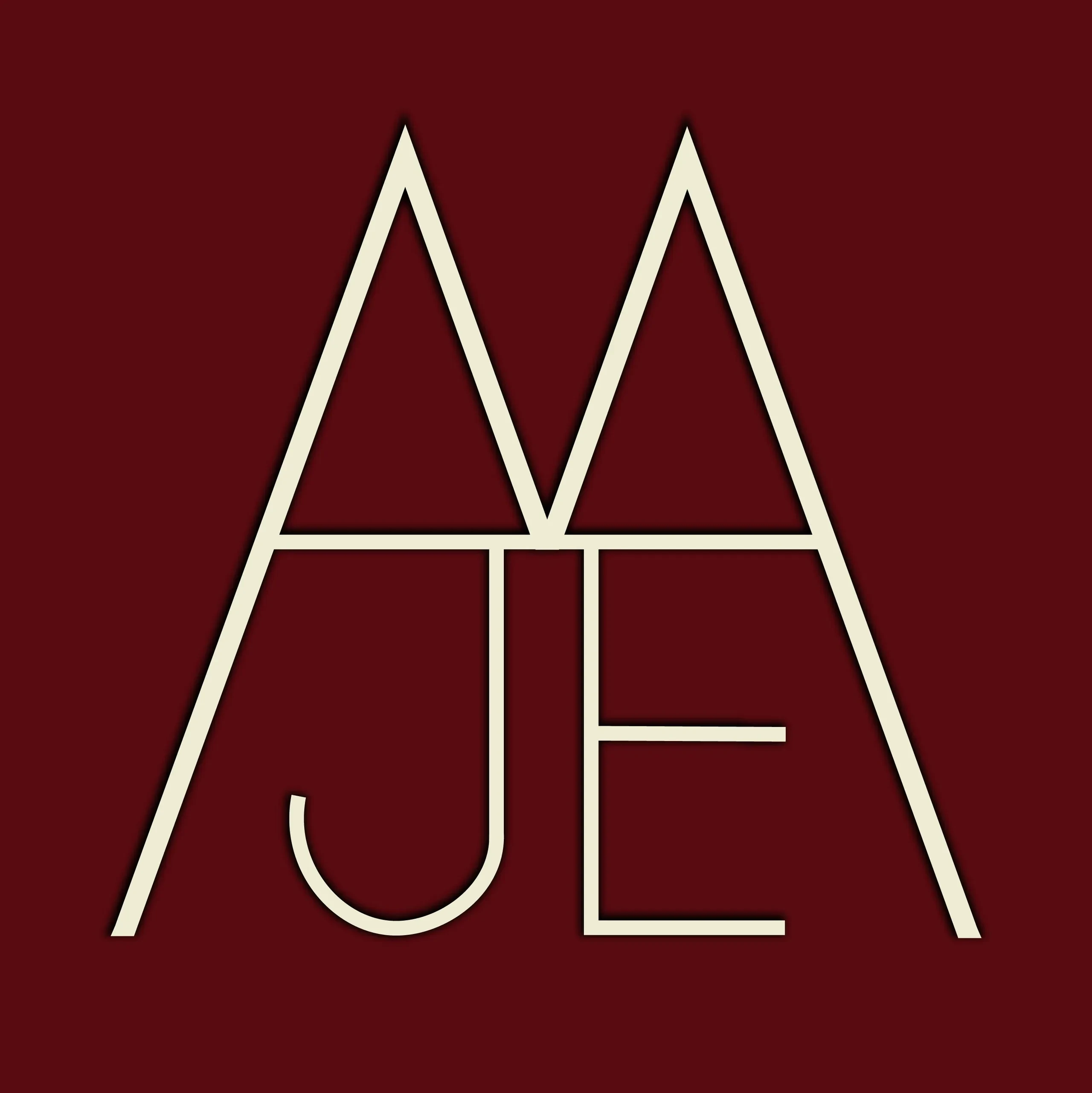 Triangle J with Coach JEM logo
